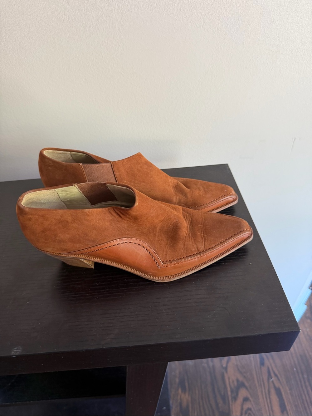 Via Spiga ankle booties crafted from a mix of smooth leather and suede